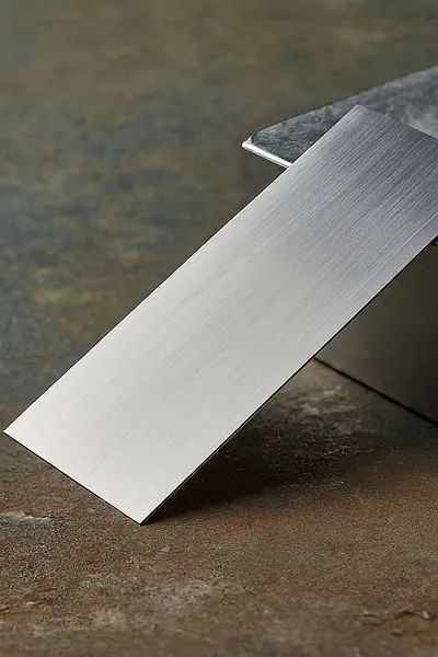 Laminated and solid metal shims for alignment